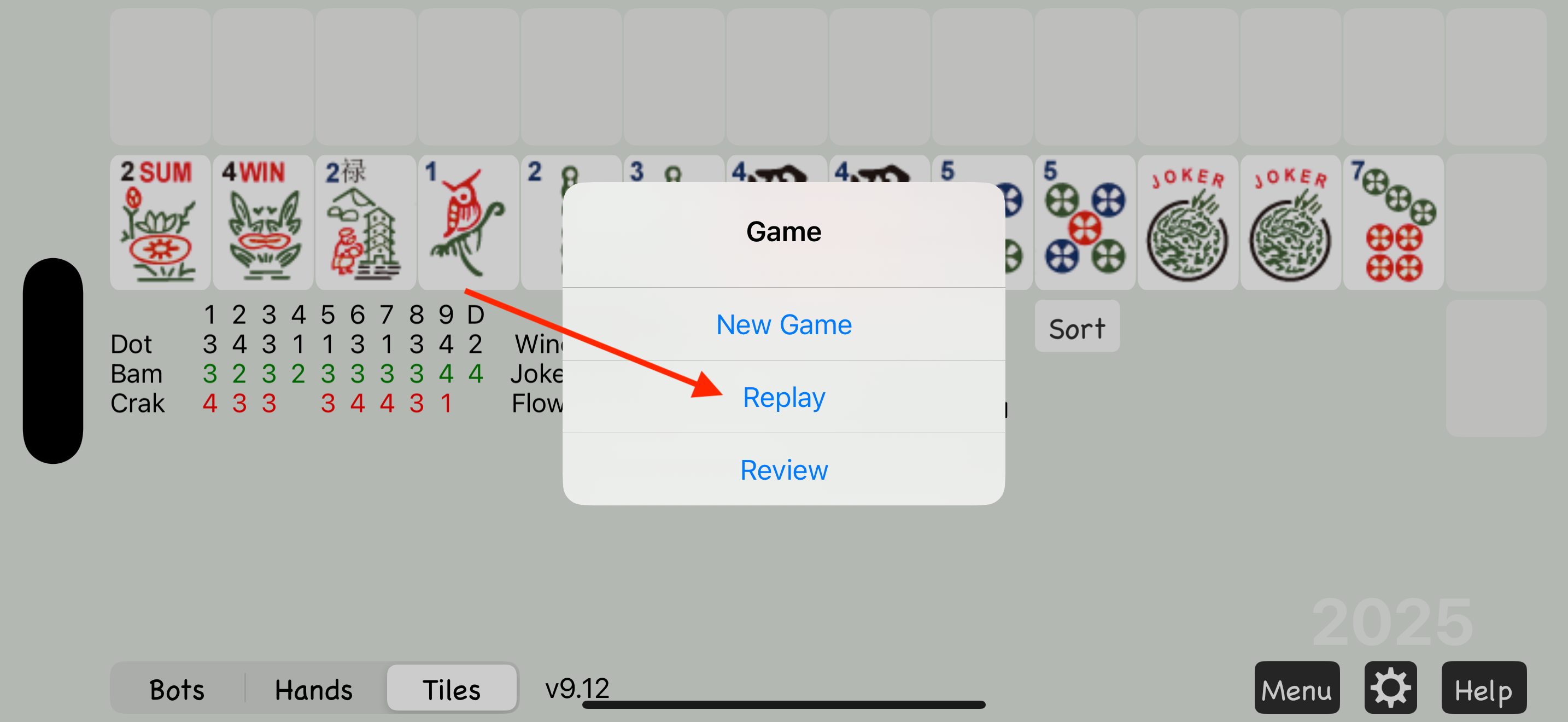 Game menu with Replay option after a hand ends
